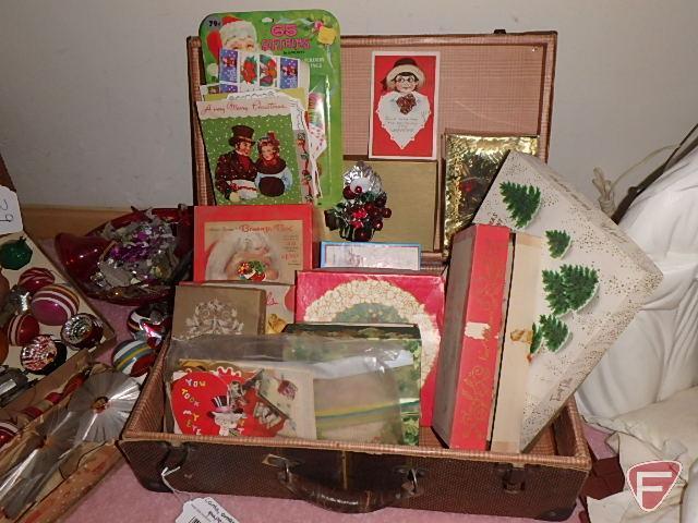 Vintage Christmas tree ornaments, cards, paper, in vintage suitcase