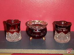 Ruby glassware, most with advertising: cream pitchers, mugs, toothpick holders, South Bend Indiana