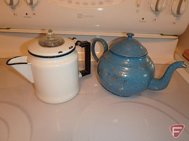 Enamel coffee pots, Lodge Logic cast iron fry pans, and match holder