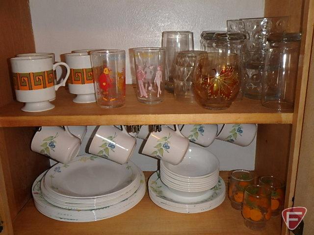 Corelle dishes, juice glasses, mugs, (2) Archie glasses; includes 4 shelves with blue items