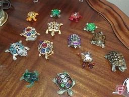 Small ornate turtles, lamp and decorative craft marbles in glass jar and Sharp clock