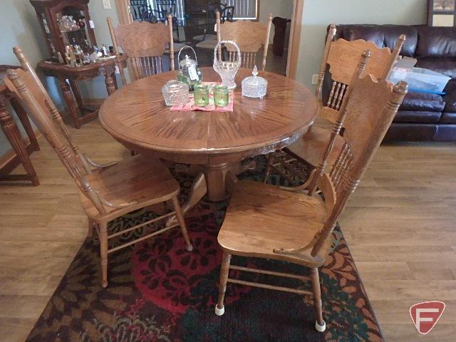 Round pedestal kitchen, claw foot like table with 5 ornate high back chairs