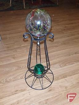 Gazing ball stand with glass ornament and green glass ball paperweight