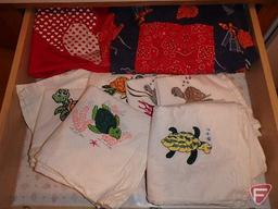 Embroidered dishtowels, aprons