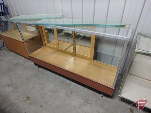 Glass display case, mirrored sliding doors, adjustable glass shelving, on wheels,