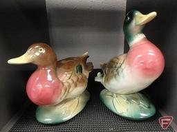 Statues:duck, geese, dog with duck, man and woman, all twelve pcs