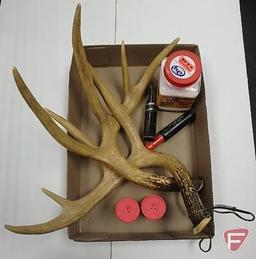 Magnum shotgun shell salt and pepper shakers, faux deer antlers, Scent Killer clothing wash, and