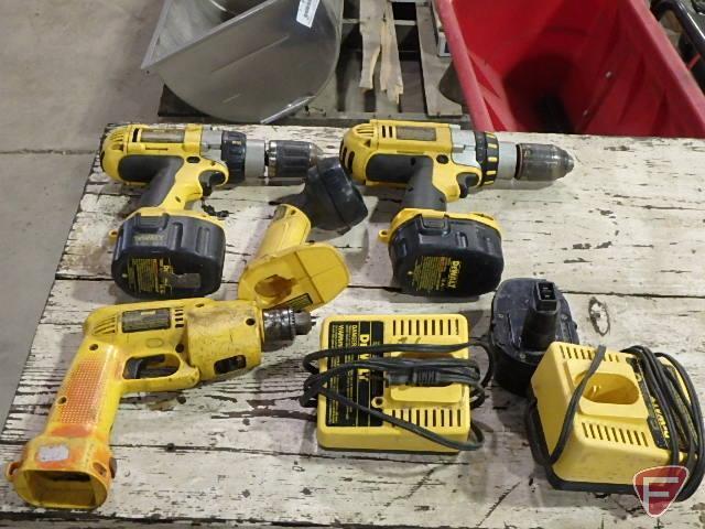 DeWalt cordless power tools: 14.4v DC930 drill, 14.4v DW991 drill, 7.2-14.4v charger, case,