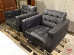 (2) leather-like arm chairs