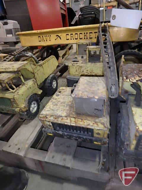 Davy Crockett metal wagon, (3) Hot Wheels cars, (2) Tonka digger cranes, and (2) Tonka dump trucks