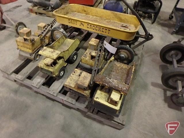 Davy Crockett metal wagon, (3) Hot Wheels cars, (2) Tonka digger cranes, and (2) Tonka dump trucks