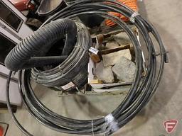 3/4" water hose, (2) rolls 400', and other roll of hoses includes landscaping pavers