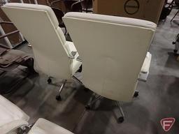 (2) white leather-like office chairs on rollers