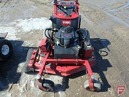 48" Toro Grandstander standing mower, 23 HP Kawasaki motor, 1,036 hours showing