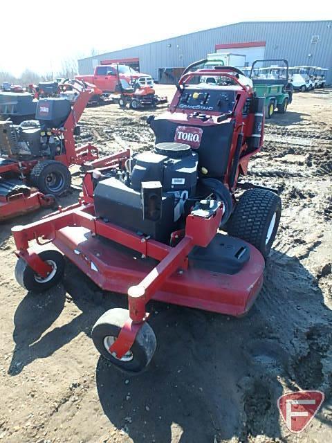Toro Grandstand 52" 23 HP standing mower, model 74549, SN: 310000465, 1,057 hrs showing