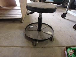 Shop stool on wheels and tie down straps