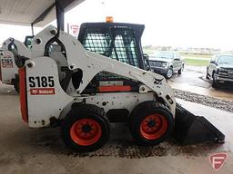 2011 Bobcat S185 skid steer loader with 67" material bucket, hydraulic quick tach, 4,854 hrs showing