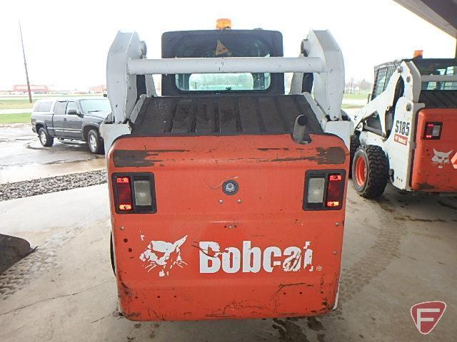 2011 Bobcat S185 skid steer loader with 67" material bucket, hydraulic quick tach, 4,854 hrs showing