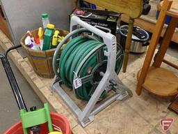 Garden hose on reel, Ace Hardware lawn spreader, sprinkler, weed killers, wood bucket