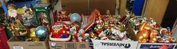 Various Christmas ornaments, figurines, books and decor