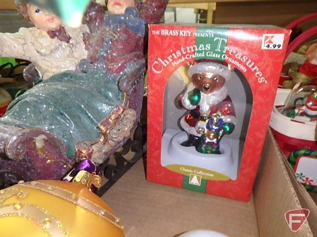 Various Christmas ornaments, figurines, books and decor