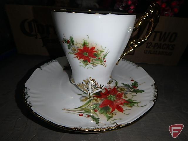 Christmas decor, artificial flowers, candle holders, tea cup with saucer, ornaments, puzzle