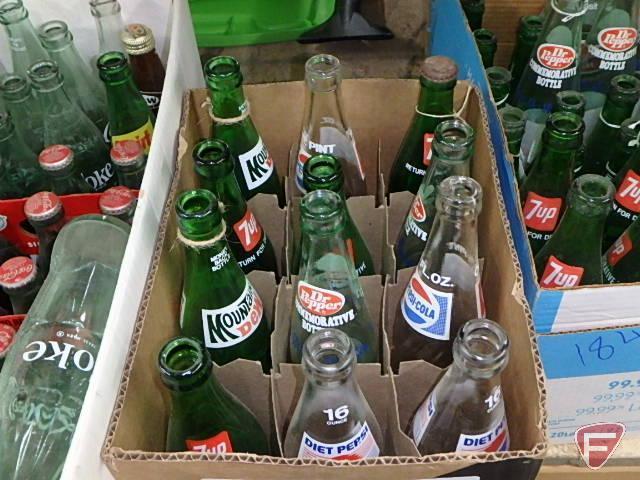 Assortment of pop bottles, Pepsi-Cola, Mountain Dew, Dr Pepper, 7Up, Coke. Contents of 6 boxes.