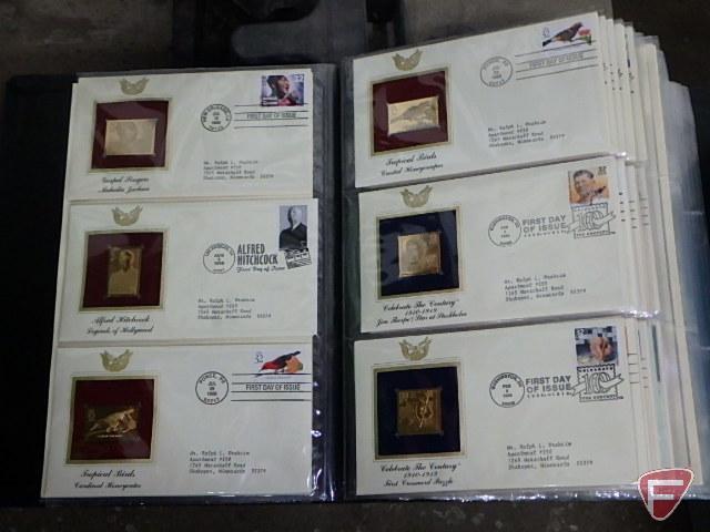 Large collection of stamps, some first day issue in binder, collection of postcards and matchbooks.