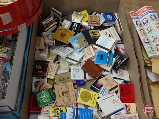 Large collection of stamps, some first day issue in binder, collection of postcards and matchbooks.