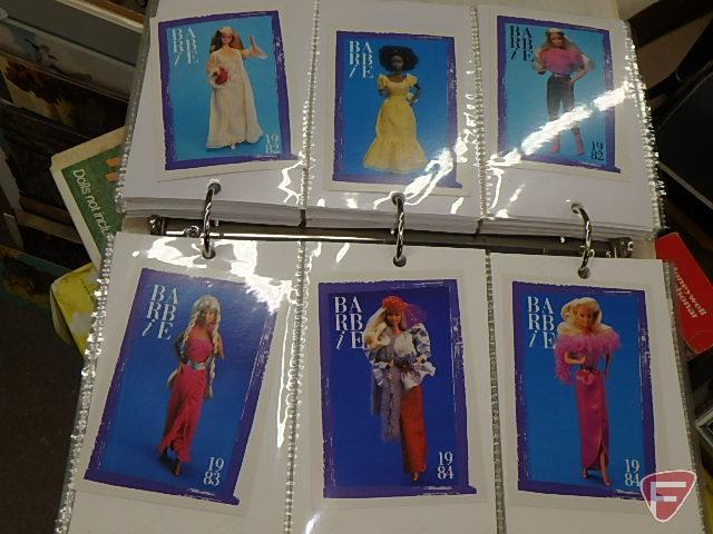 Vintage Barbie and Ken vinyl boxes, Barbie collector cards in binder, and Barbie's Pool Party.
