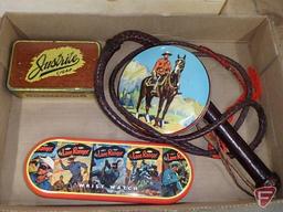 Lone Ranger wrist watch, Justrite Cigars and Canadian Mountie tins, leather whip