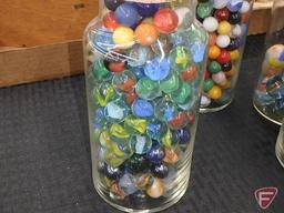 (4) glass jars with assorted marbles