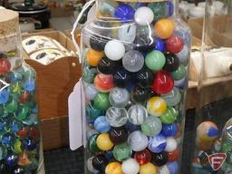(4) glass jars with assorted marbles