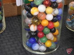 (4) glass jars with assorted marbles