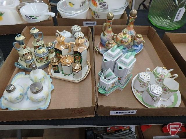 Porcelain condiment sets. Contents of 2 boxes