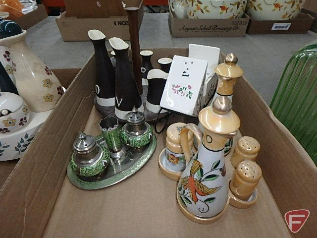 Porcelain condiment sets, 2 on turntable, and one metal salt/pepper and toothpick set.