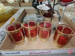 Red glass cordials, metal stand, and liqueur decanter in metal stand.