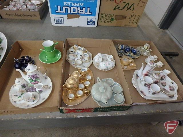 Porcelain and ceramic miniature tea sets. Contents of 3 boxes