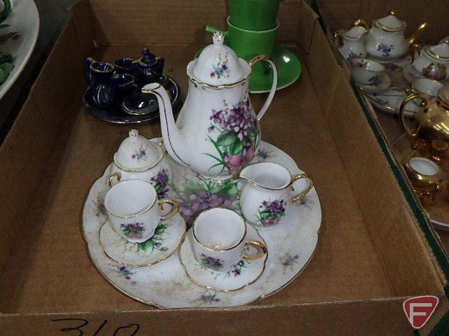 Porcelain and ceramic miniature tea sets. Contents of 3 boxes