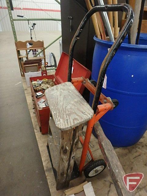 Wood step ladder, metal cart, indoor/outdoor ceramic tile, wheel barrow, grease gun, and