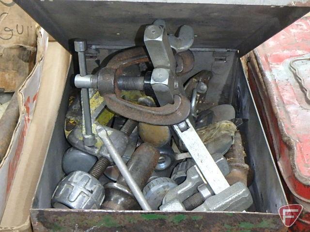 Copper pipe fittings, hand tools, saws, sockets, clamps, hardware.
