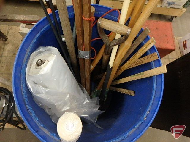 Plastic barrel with yard and garden tools, yard sticks, shrink wrap, plastic wrap, shepherds hooks,