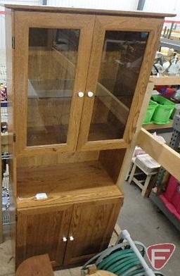 Wood cabinet/hutch, top 2 glass doors and one adjustable glass shelf, bottom has 2 doors