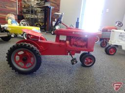 McCormick Farmall Super H pedal tractor with plastic seat steering wheel and fenders