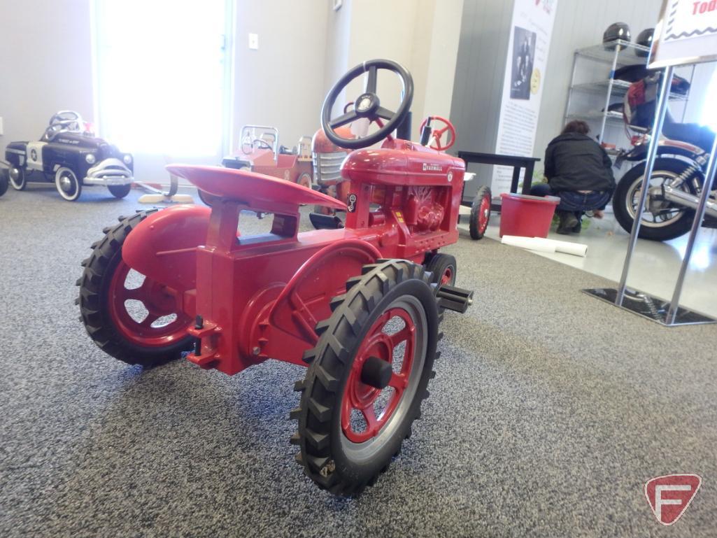 McCormick Farmall Super H pedal tractor with plastic seat steering wheel and fenders