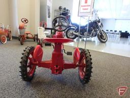 McCormick Farmall Super H pedal tractor with plastic seat steering wheel and fenders