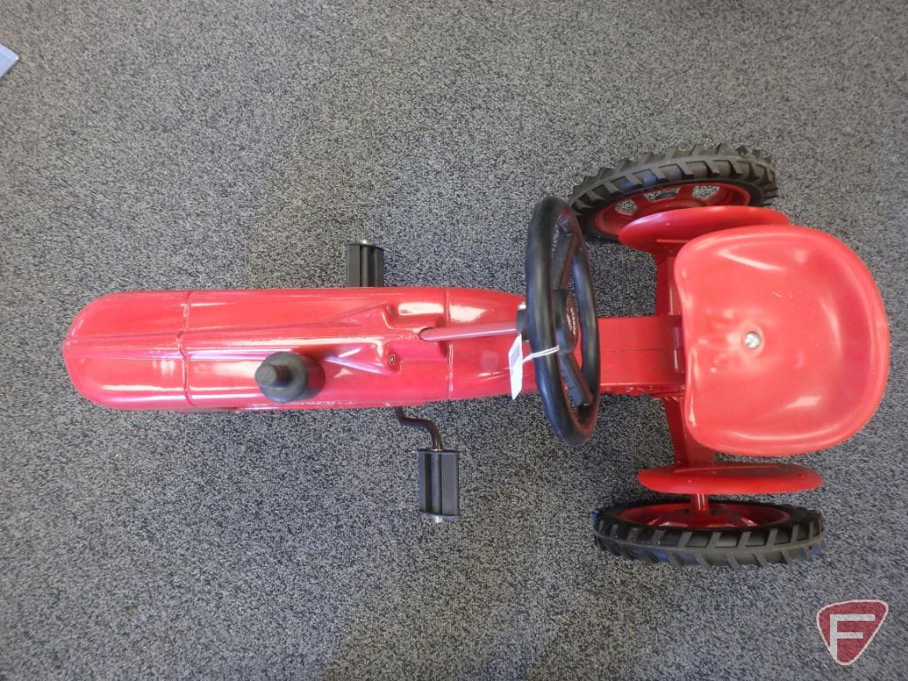 McCormick Farmall Super H pedal tractor with plastic seat steering wheel and fenders