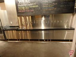 Custom stainless steel beer and wine dispensing station with stone countertop,