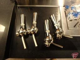 Custom stainless steel beer and wine dispensing station with stone countertop,