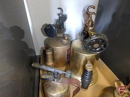 Brass torches and oiling cans, (2) candle holders, both